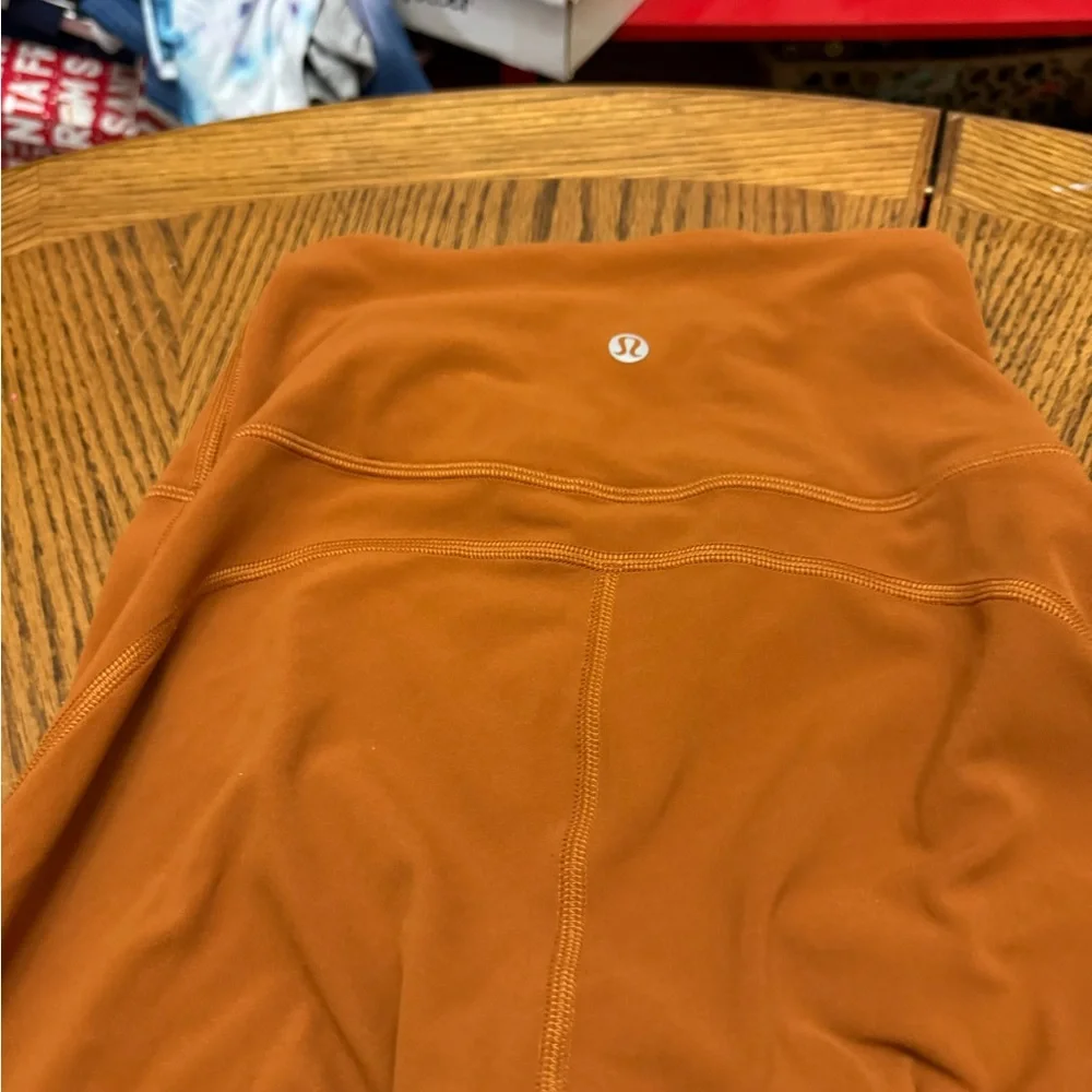 lululemon athletica Burnt Orange Flare Leggings - Picture 5 of 8
